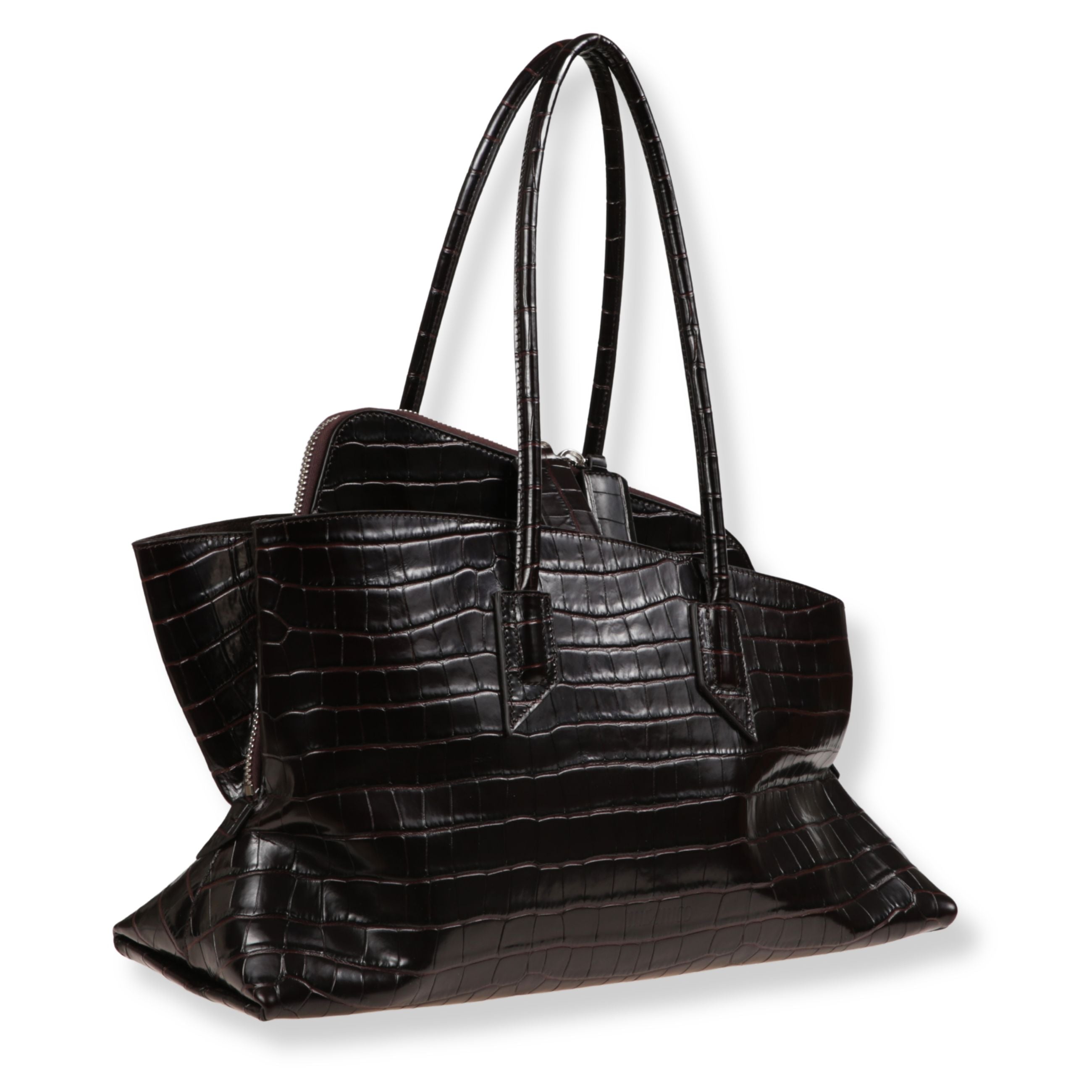 Borsa in pelle the attico effetto coccodrillo. corpo con cadenze morbide e forma asimmetrica. doppi manici superiori. chiusura superiore a zip su struttura rigida.