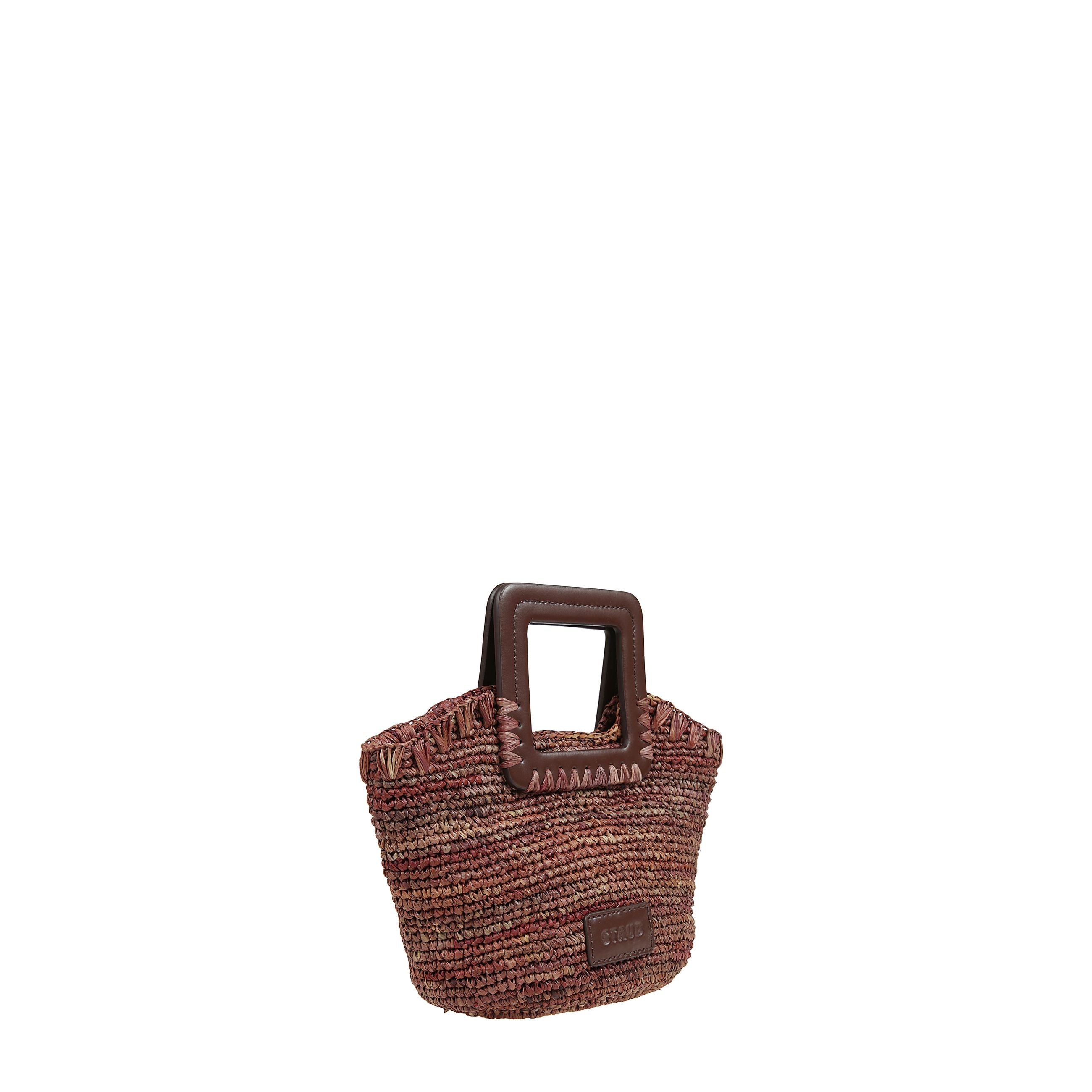Borsa a mano shirley mini in raffia con chiusura magnetica nascosta e manici corti ha la tracolla regolabile e rimovibile.