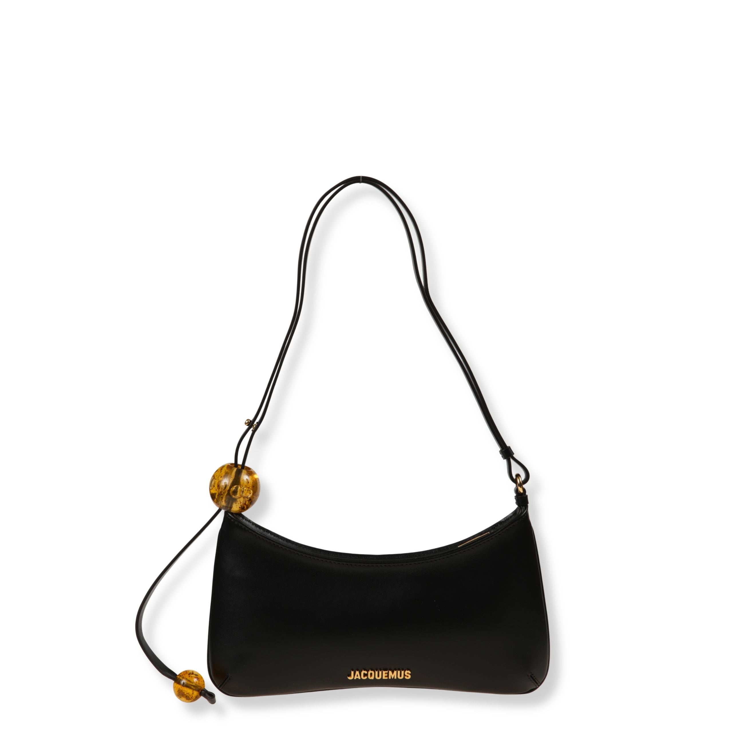 Le bisou perle jacquemus. design in pelle liscia a tinta unita, con chiusura superiore a zip nascosta. tracolla sottile regolabile con due sfere in resina ambrata decorative.