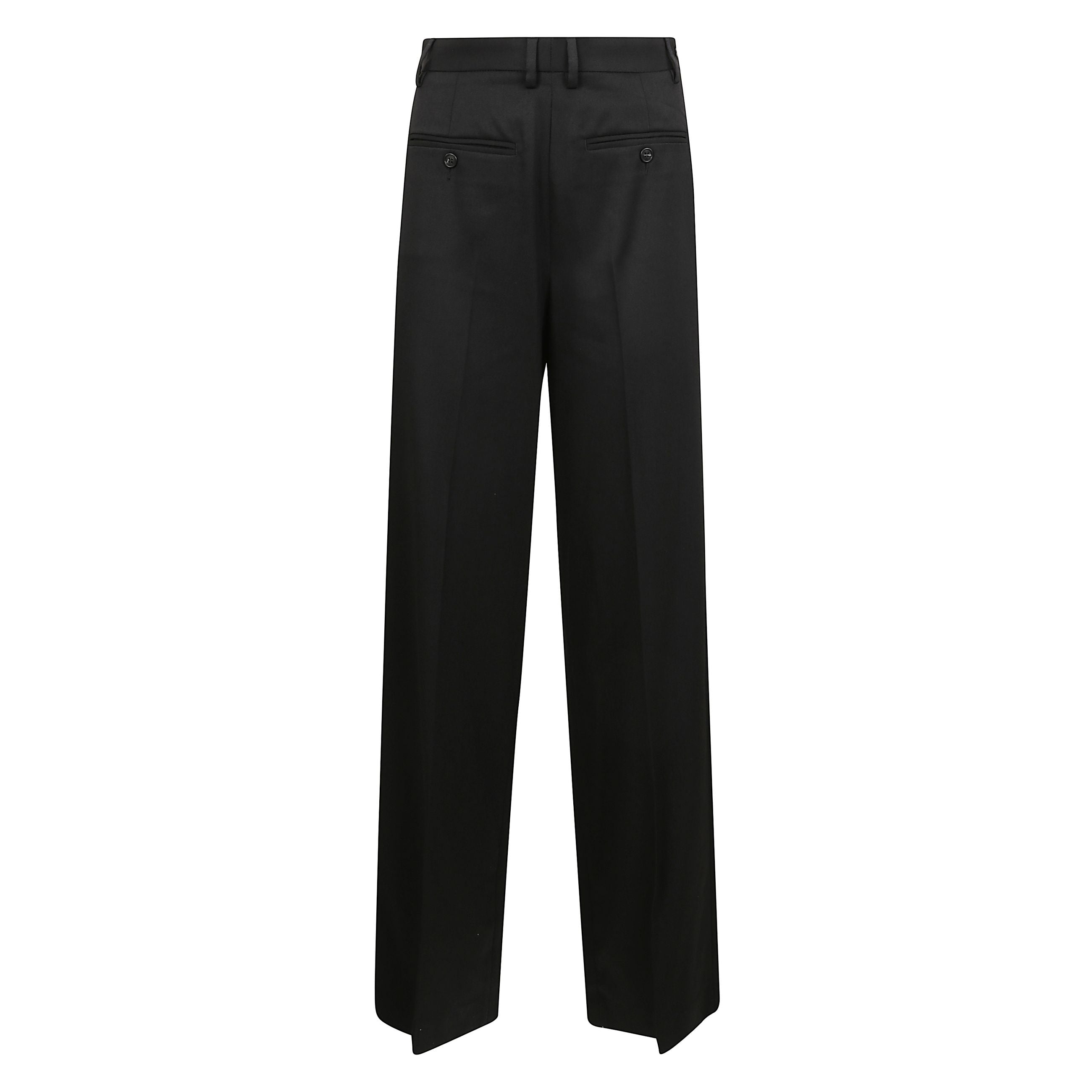 Pantaloni in twill stretch. passanti per cintura in vita. chiusura con cerniera a scomparsa sul fianco. due tasche frontali e due tasche posteriori a fessura. pieghe centrali stirate. dettaglio riga orrizzontale mm6 sul retro.