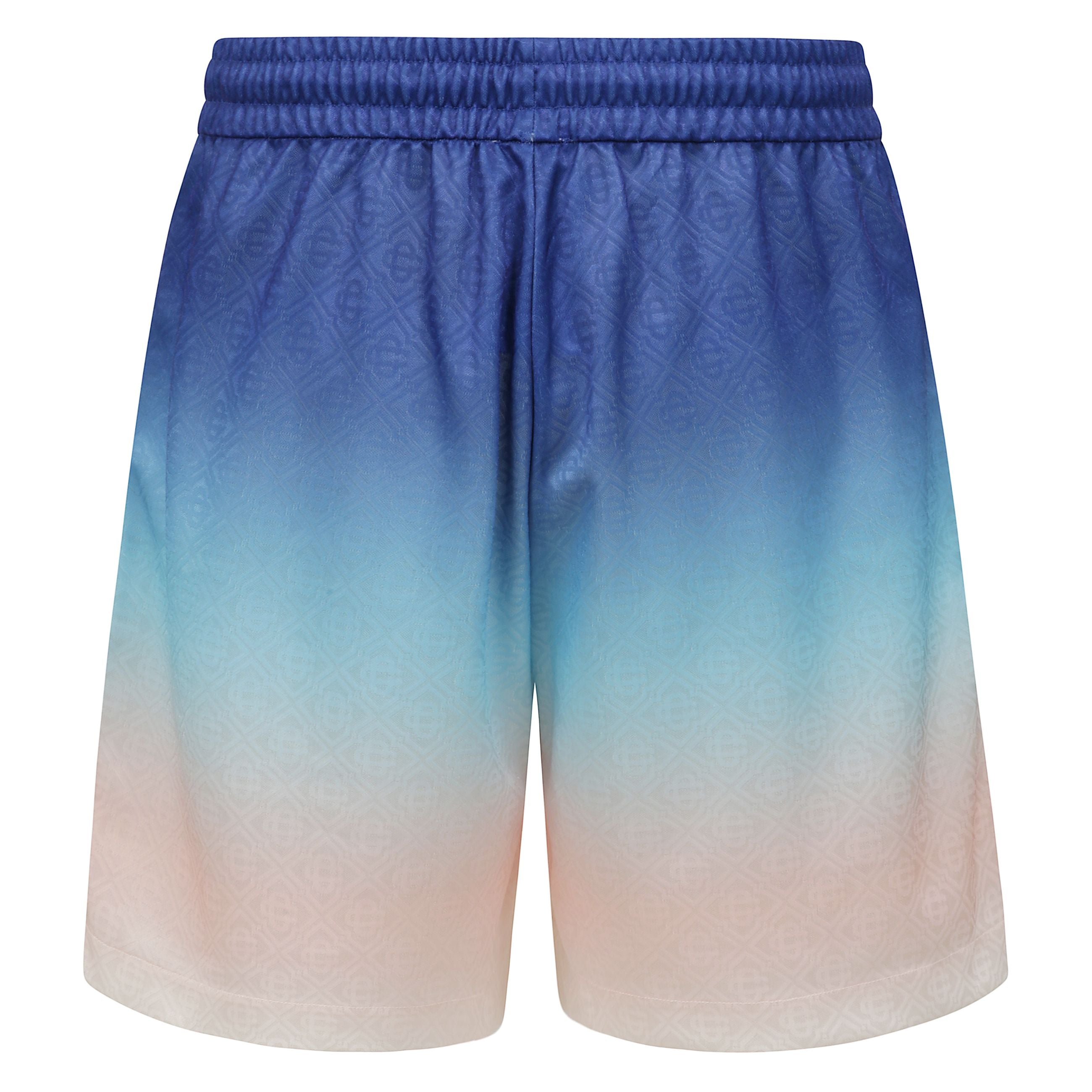 I pantaloncini da calcio gradient sono un design sportivo caratterizzato da una serie di colori sfumati che enfatizzano i temi fondamentali. realizzato in tessuto jacquard monogram in poliestere con il logo casablanca sul fianco. completa di vita elastici