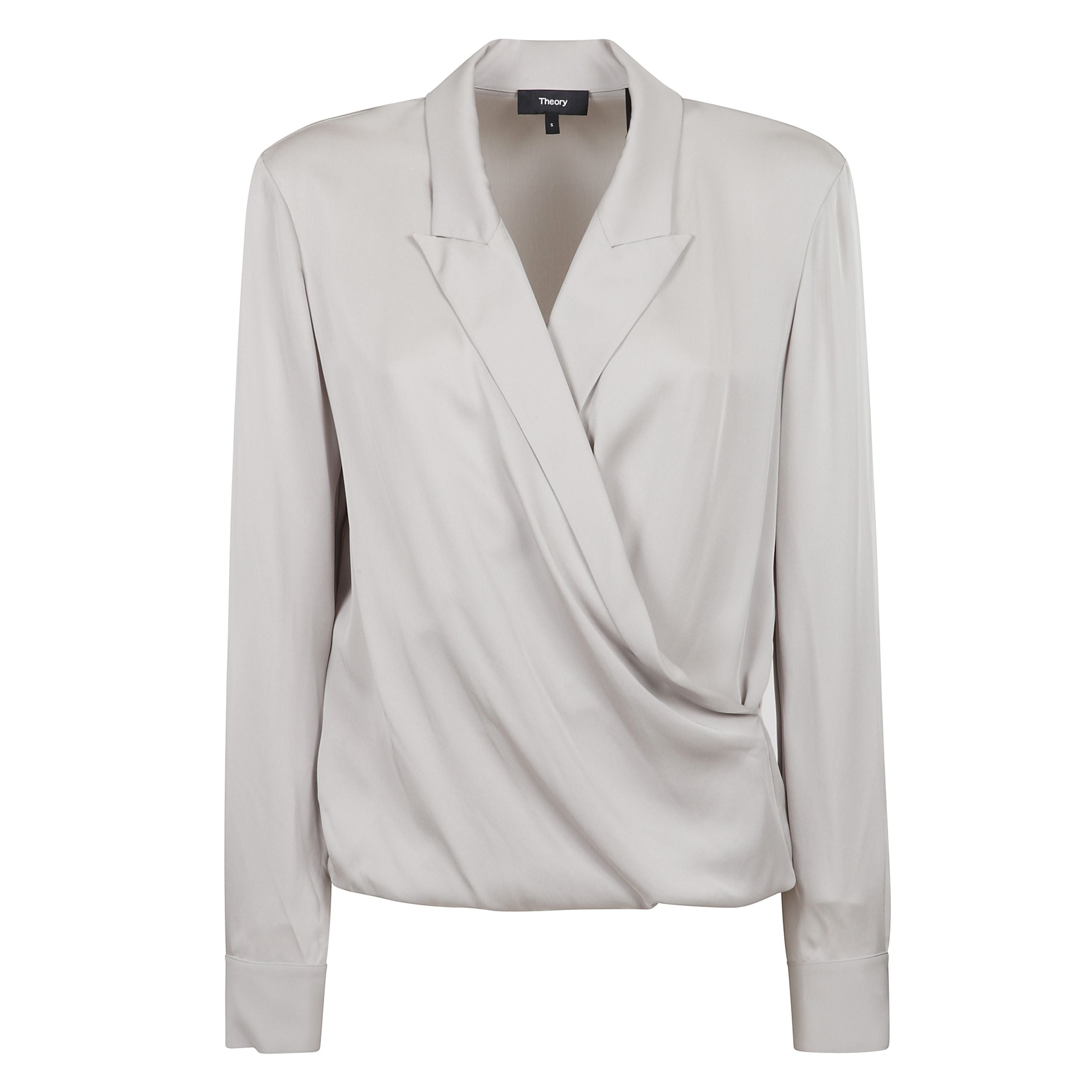 Blusa nera a maniche lunghe con revers a lancia