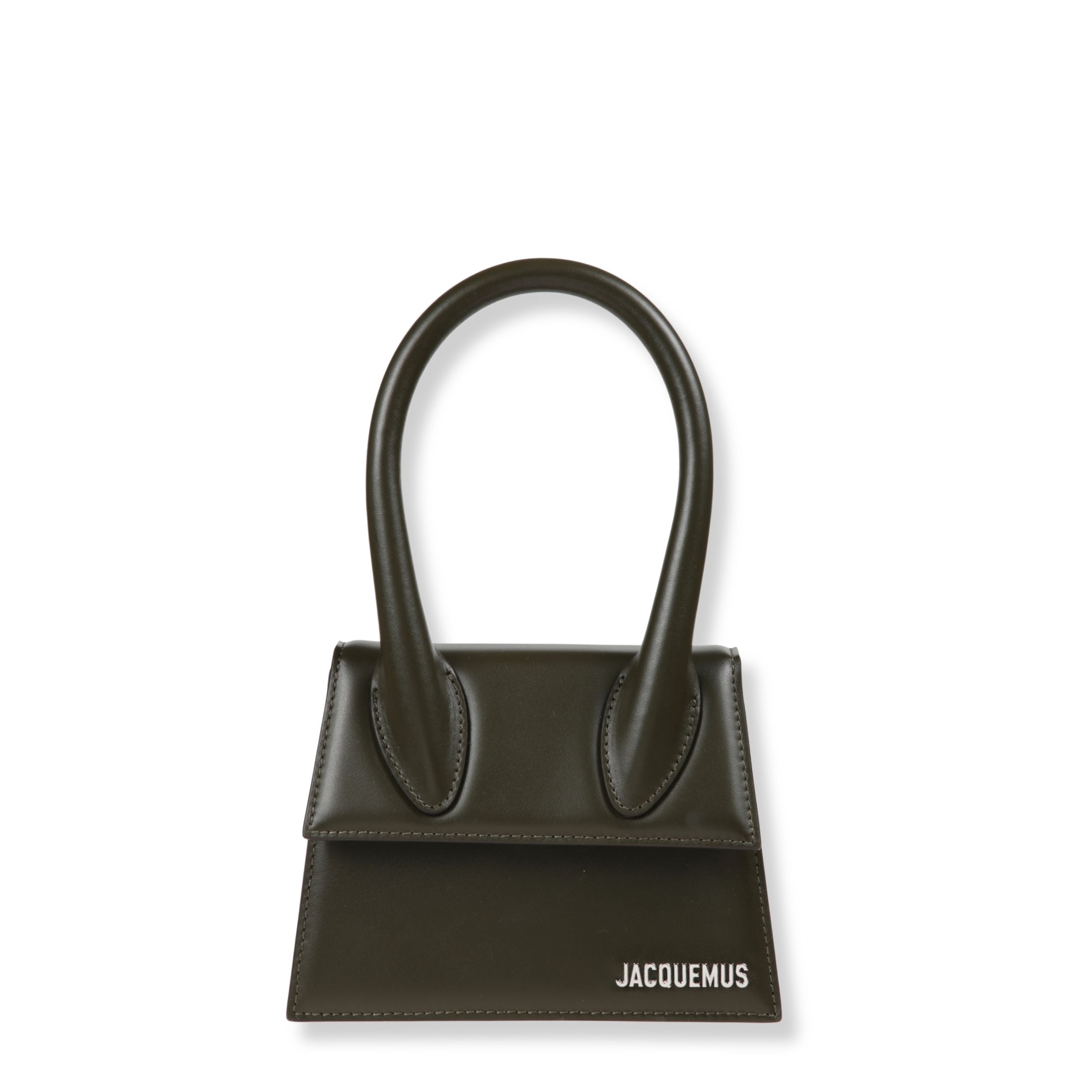 Le chiquito moyen. design rigido in pelle liscia con chiusura superiore con patta. manico a forma di arco. dotata di tracolla regolabile removibile.