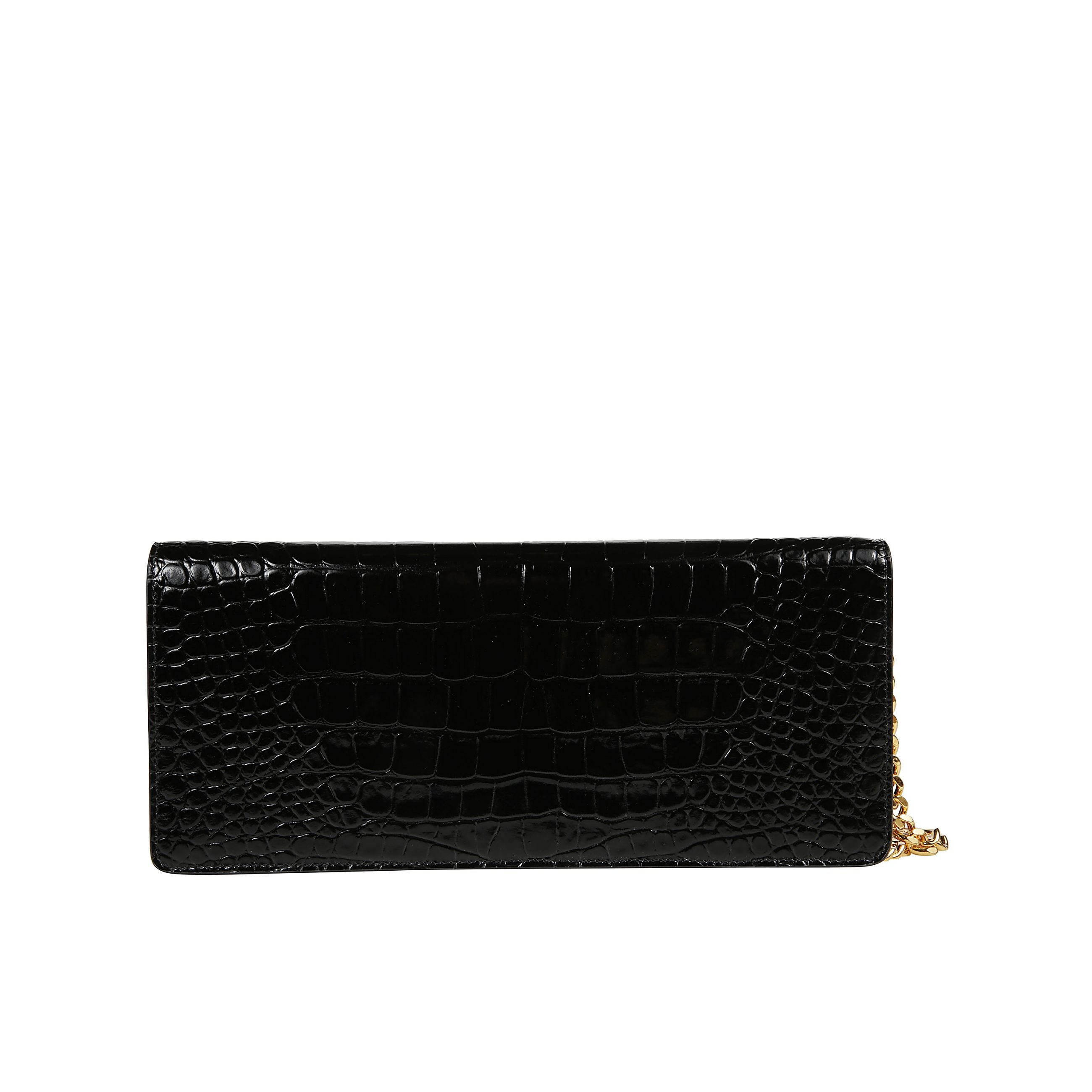 Clutch con effetto coccodrillo