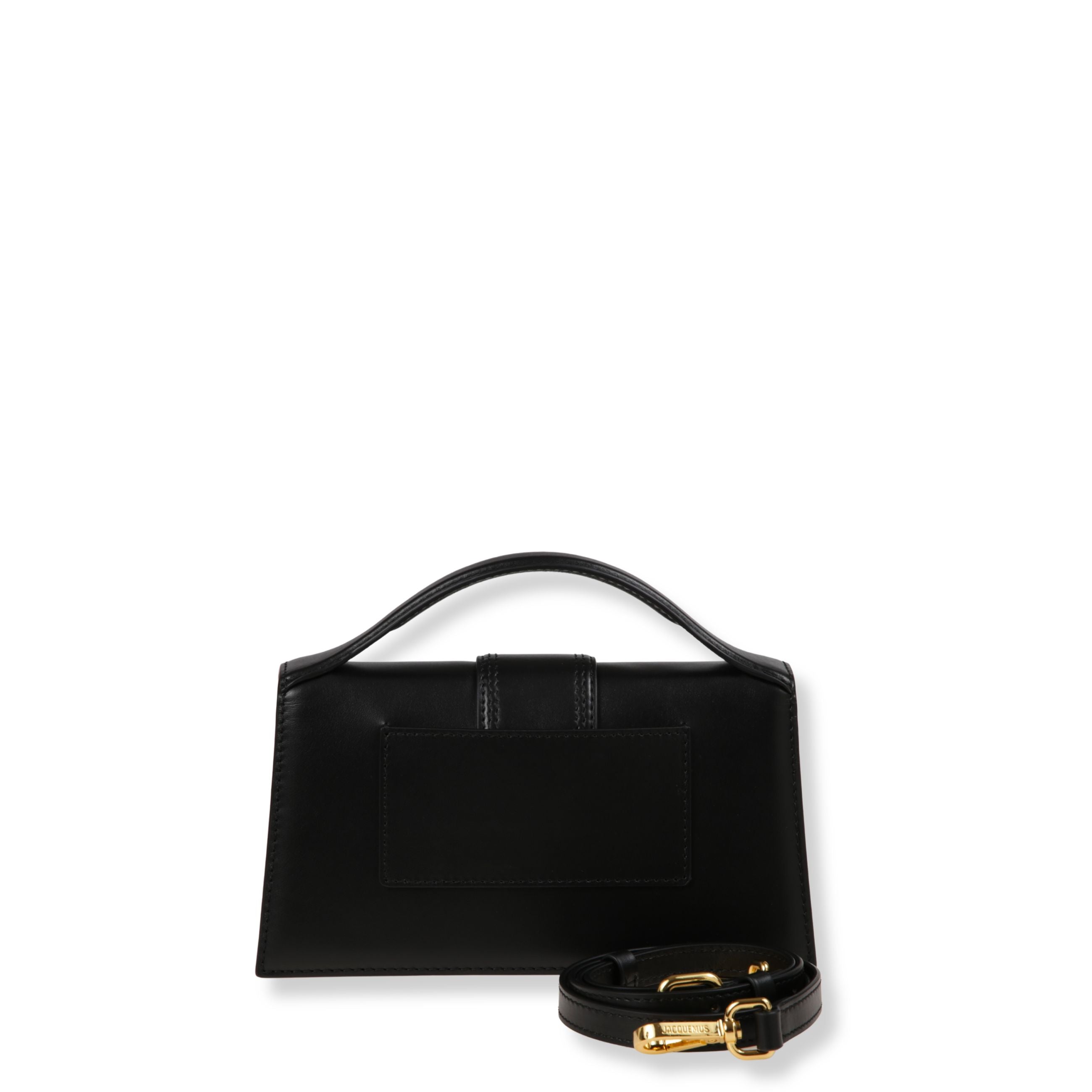 Le grand bambino jacquemus. struttura rigida in pelle liscia. chiusura frontale con patta e fibbia. manico arcuato. dotata di tracolla regolabile removibile.