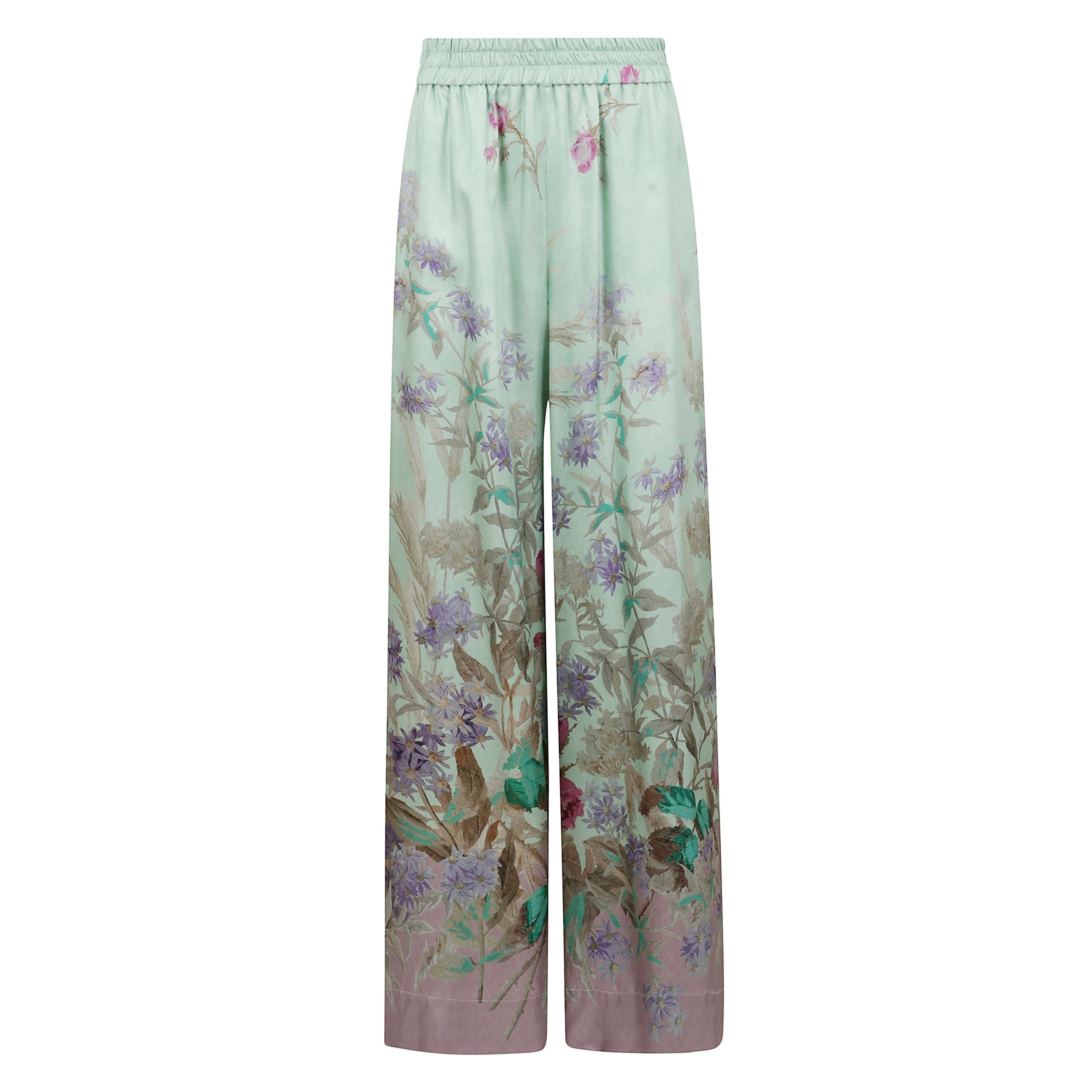 Pantaloni a palazzo con fantasia floreale.