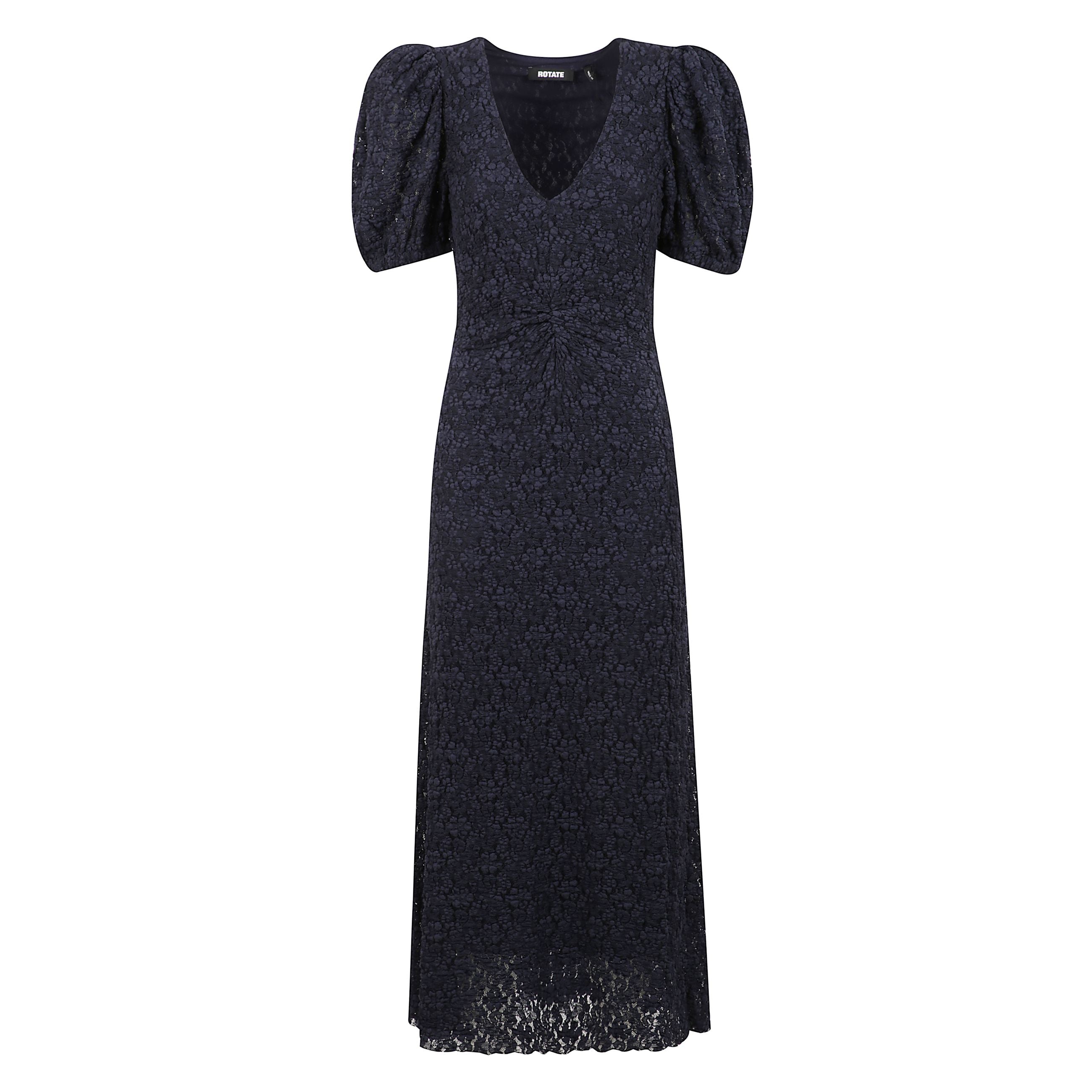 Abito lungo con pizzo tema floreale e maniche a palloncino.