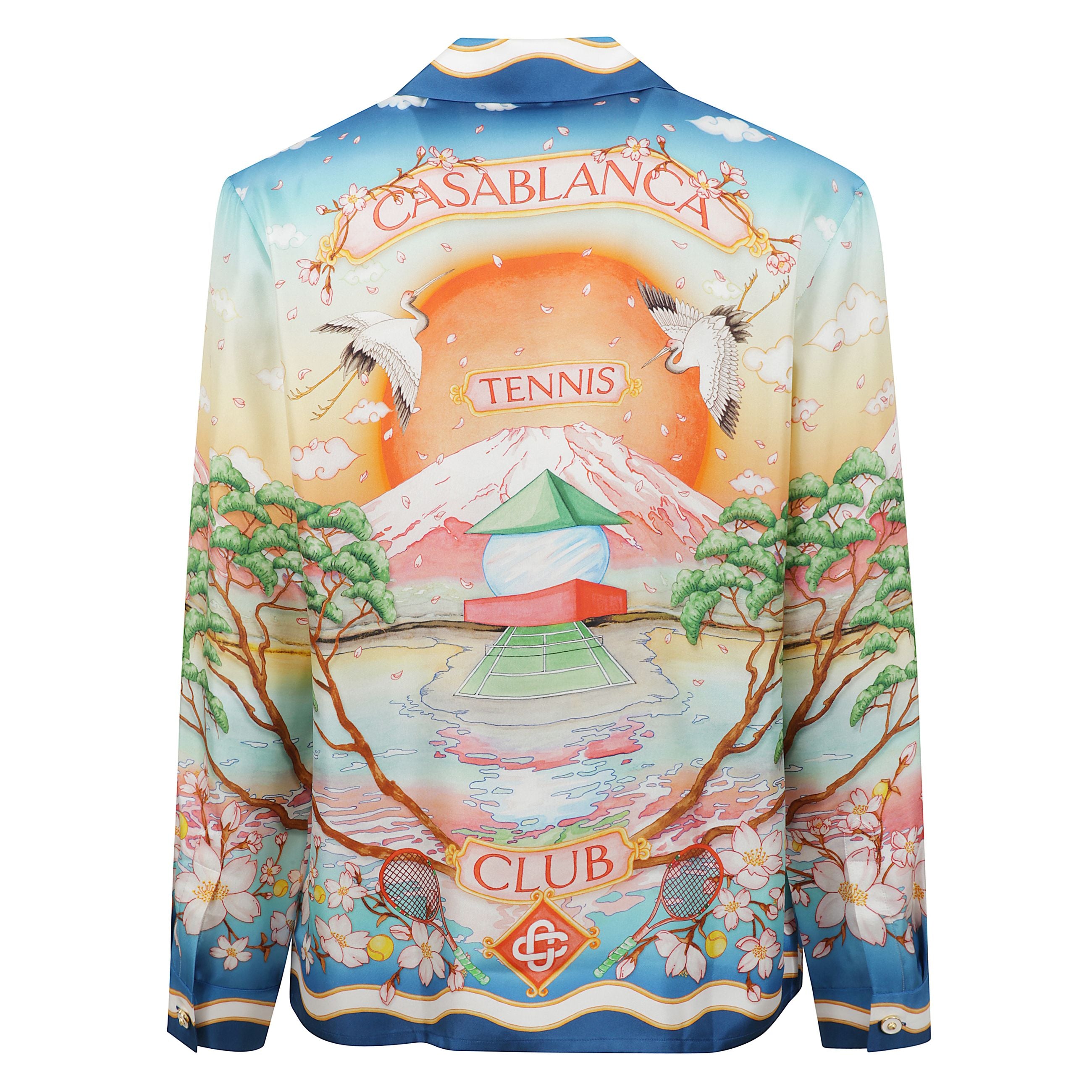 Camicia in seta.  colletto stile cubano. chiusura frontale con bottoni. stampa integrale su fronte e retro. taschino frontale applicato e sul retro.