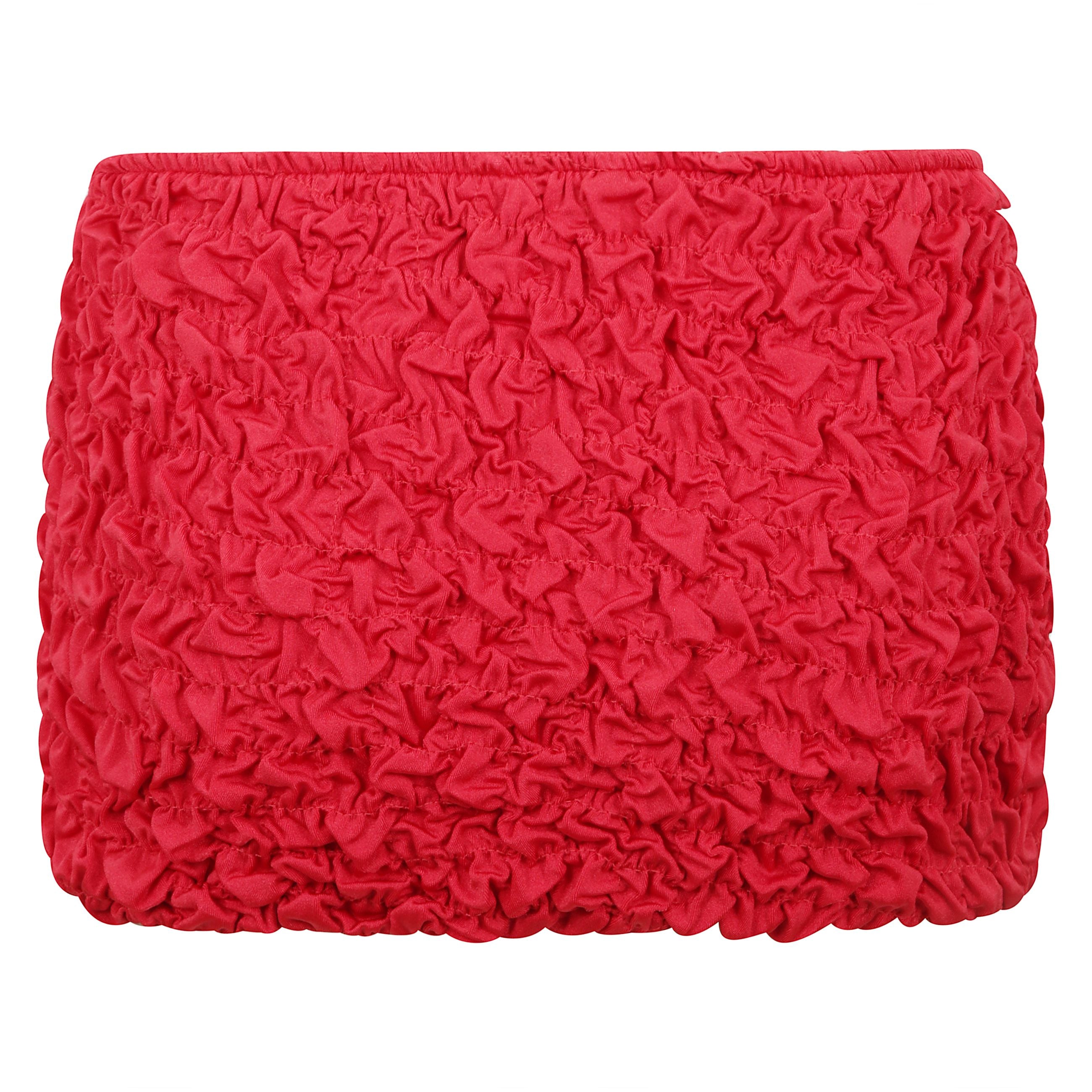 La mini gonna da spiaggia lia Ã¨ realizzata in tessuto shirring per un drappo perfettamente  lussuoso.