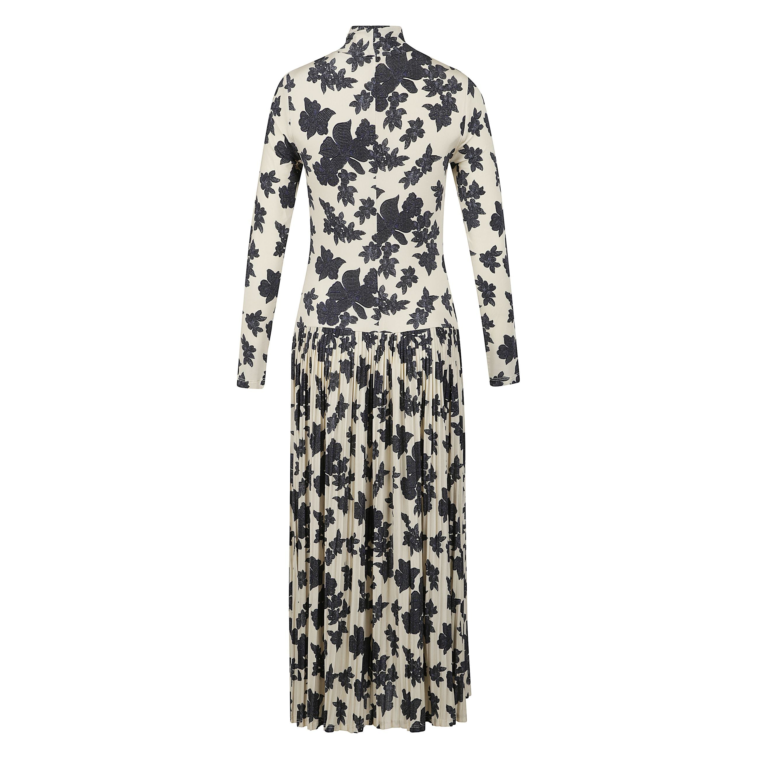 Il nostro jersey tricot signature viene reinventato nellâabito amaya, impreziosito dalla nostra stampa monarch multicolore. questa silhouette intramontabile presenta un collo a dolcevita, maniche lunghe e si adatta alla forma del corpo prima di scivolar