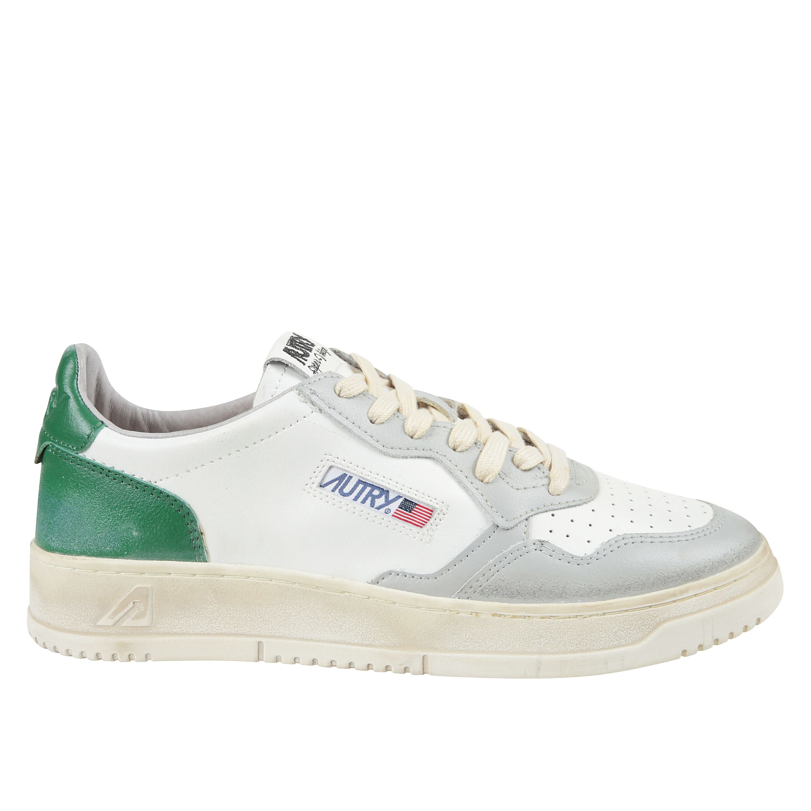 Sneaker stringata super vintage in pelle con suola in gomma
